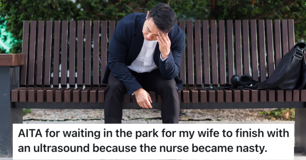 man sitting on a park bench