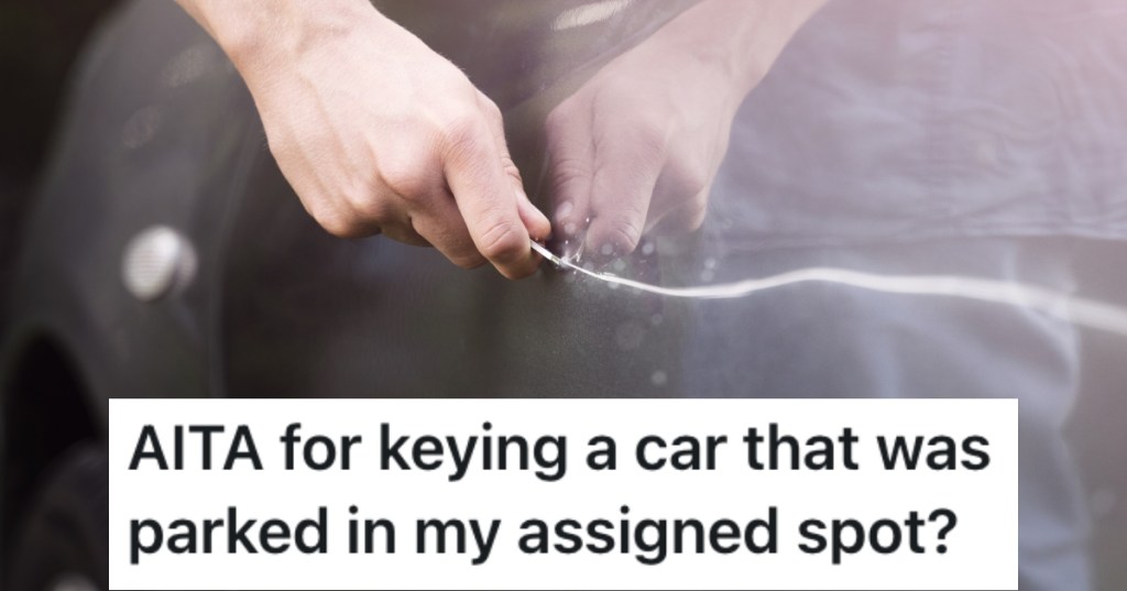 a person keying a car