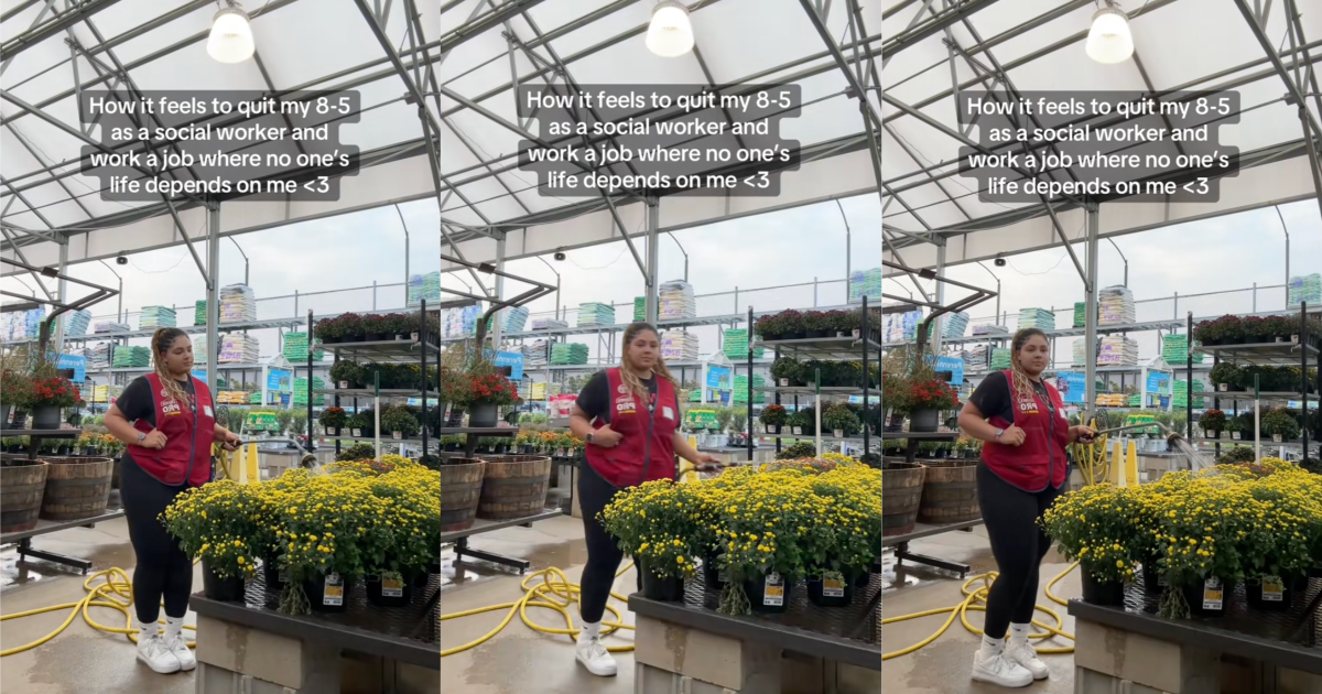 woman watering plants in a store