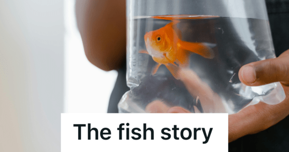 man holding a bag of goldfish