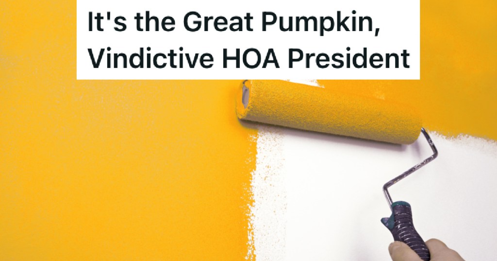 person painting house orange