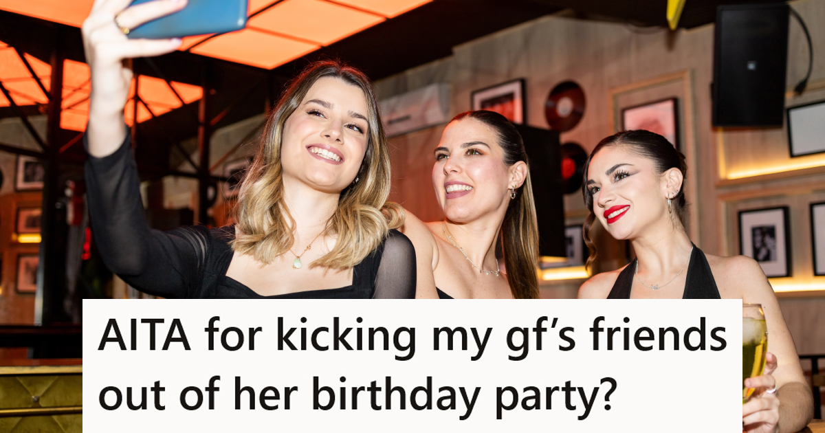 Women taking pictures at a bar