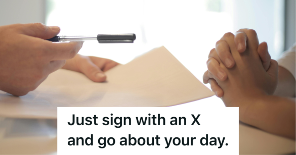 person holding a pen and paper