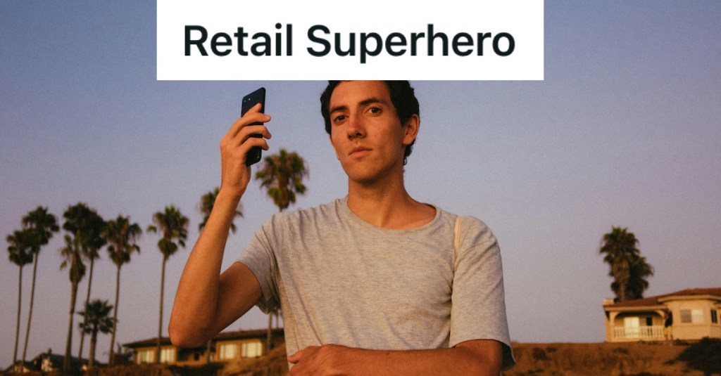 man holding up a cell phone