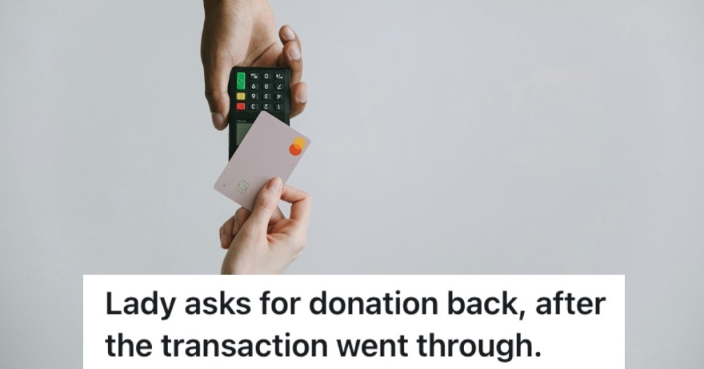 person scanning a credit card