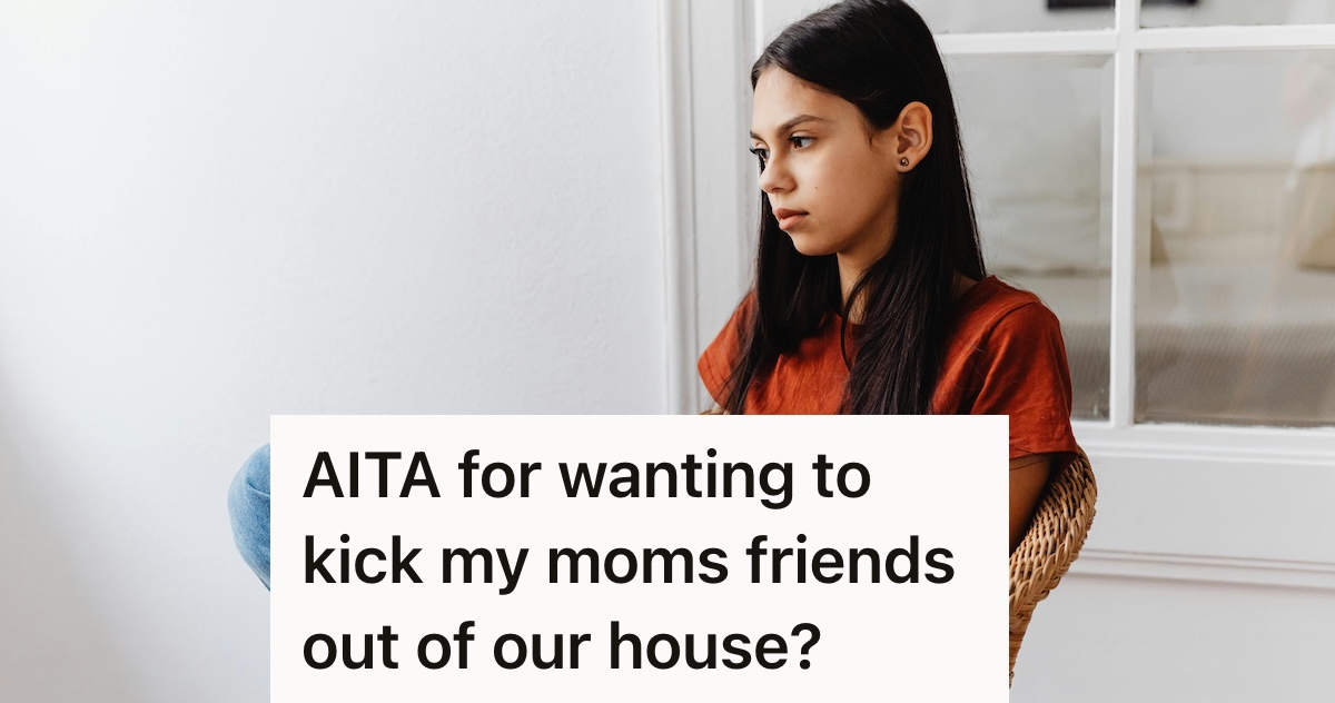Girl in a red shirt with long brown hair looking sad while sitting in a chair.