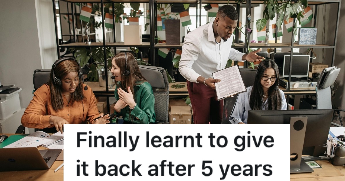 upset man in a room full of computers