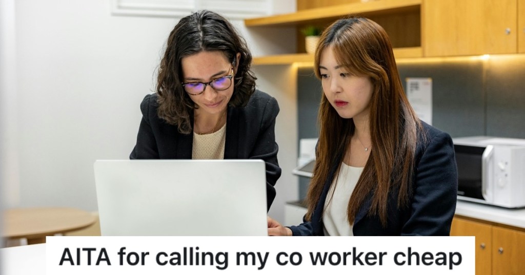 two women looking at a laptop