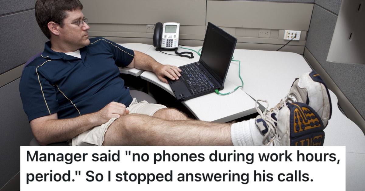 man with his feet on his desk