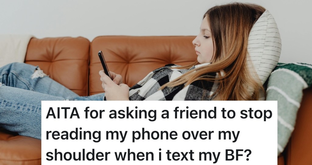 woman laying down texting