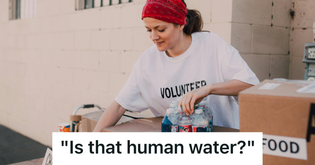 volunteer handing out water