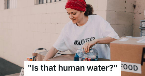volunteer handing out water
