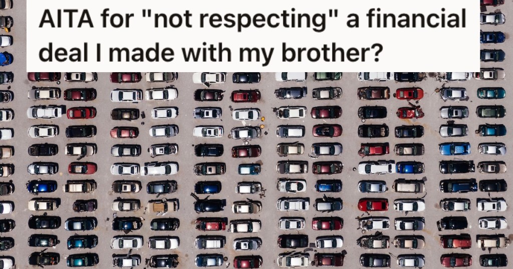 An overhead shot of cars in a parking lot