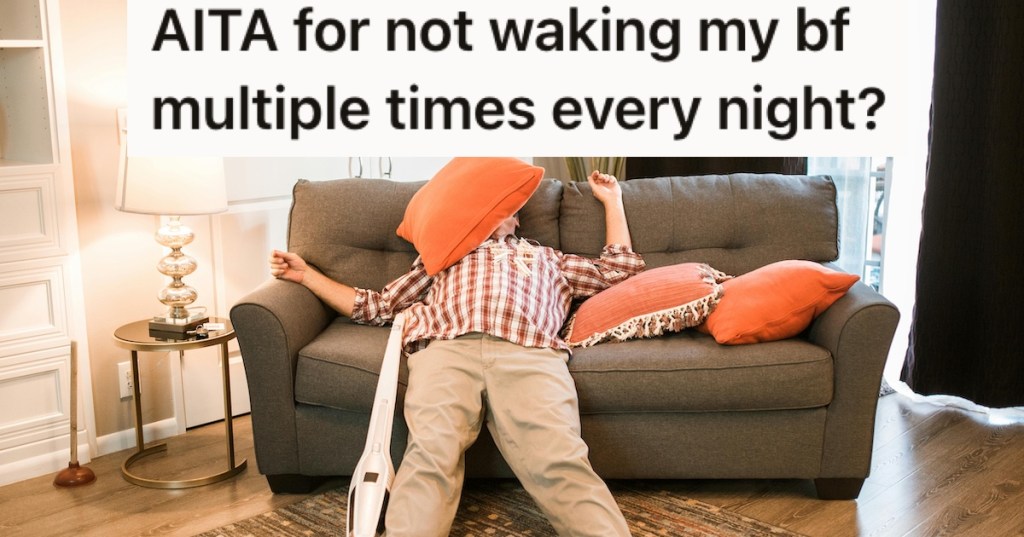 A man asleep under couch cushions