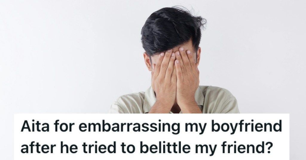 A man with his hands over his eyes