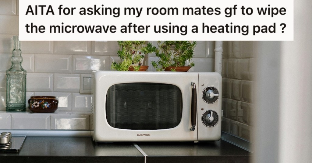 A white microwave with silver dials