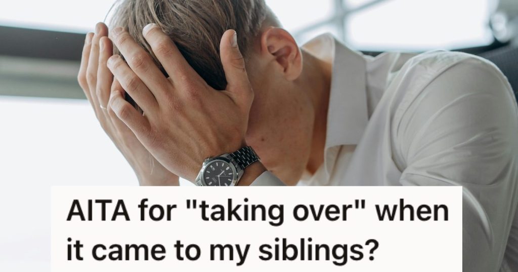 A man in a shirt with his head in his hands