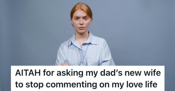 A woman in a blue shirt frowning