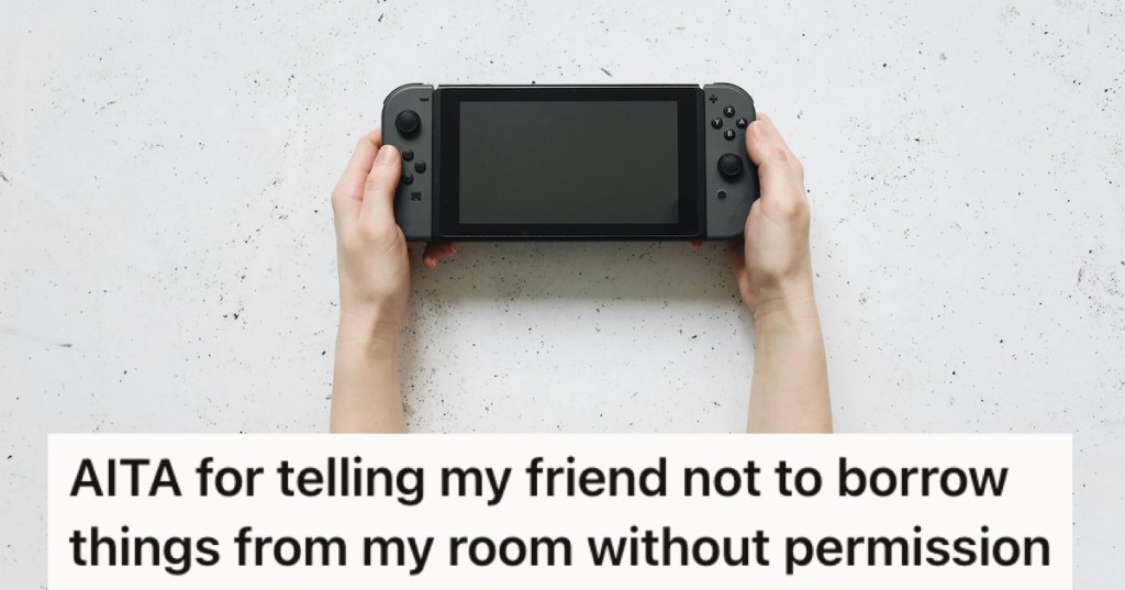 A Nintendo Switch in two hands