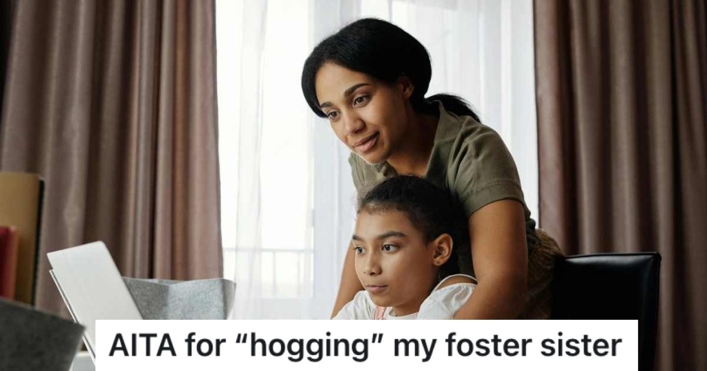 woman helping a girl on a computer