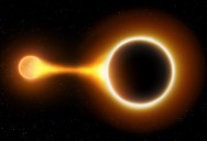 Two Black Holes Collide While Being Pulled Into Another Nearby Supermassive Black Hole For The First Time Ever Observed