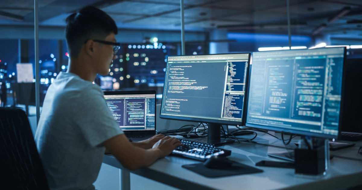 College Graduates With A Computer Science Degree Are Finding It Harder Than Ever To Get A Job In Their Field Young man working on computers