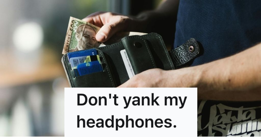 Man taking bills out of his wallet