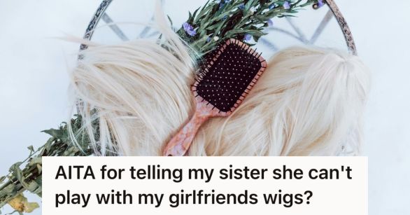 A blonde wig laid out iwth a brush on top