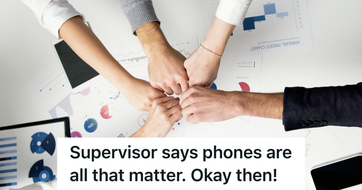 Office workers doing a group fist bump