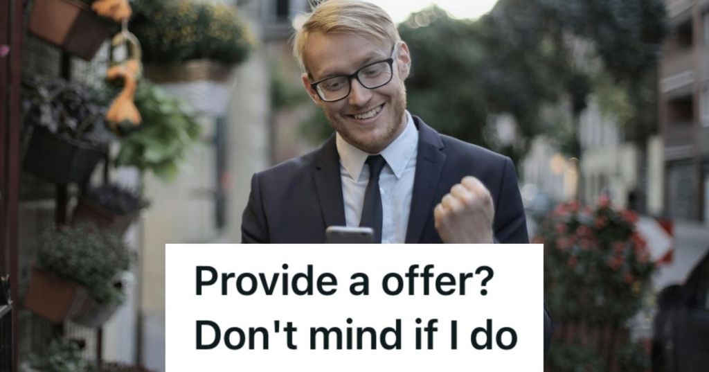 Man in a suit doing a fist pump