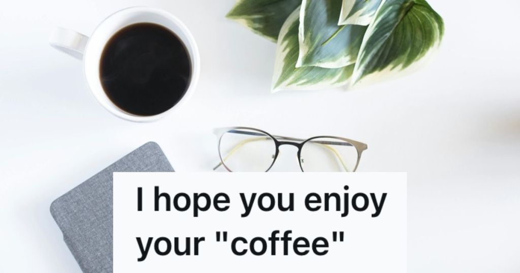 Coffee cup on a table with glasses and a notebook