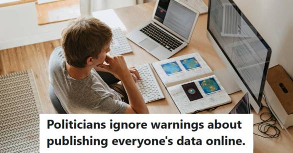 IT worker sitting in front of three screens building a portal