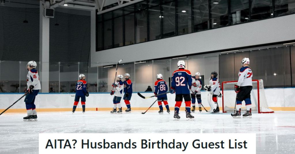 Hockey players lined up on the ice getting ready to play