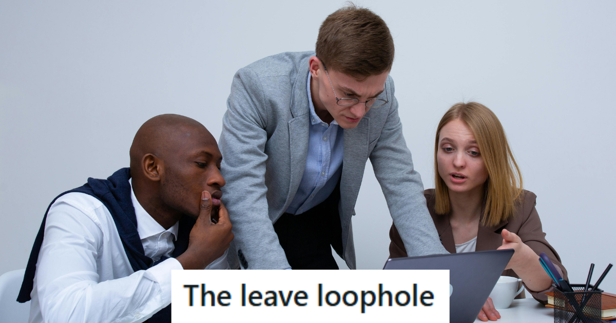 three people working on a laptop