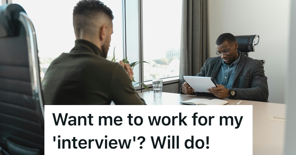 Man sitting on a desk interviewing another man