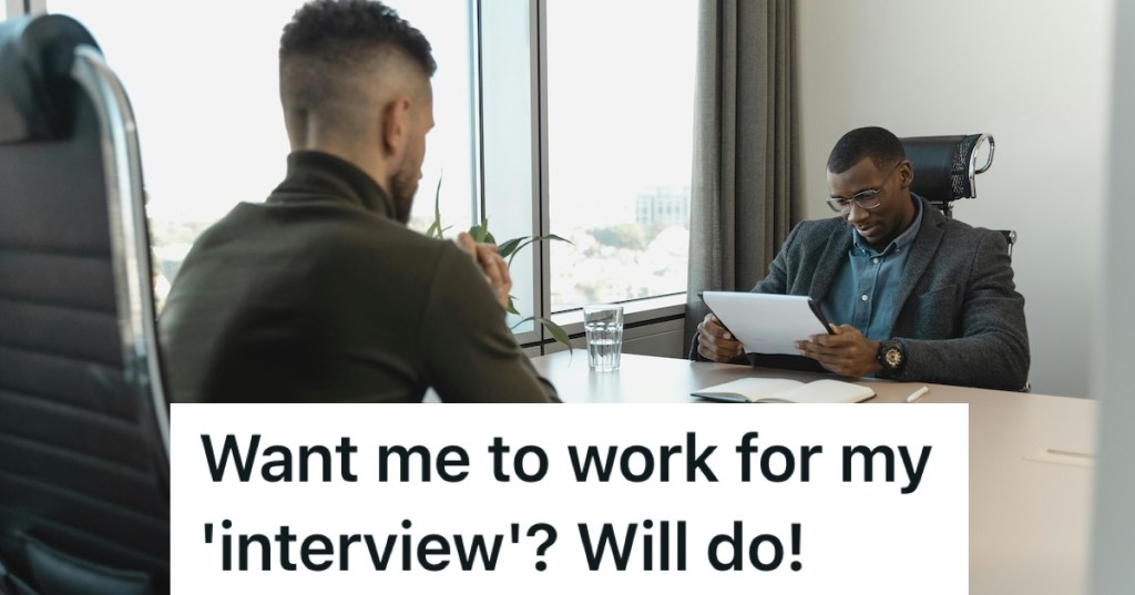 Man sitting on a desk interviewing another man