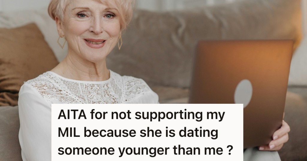 Older woman holding a laptop