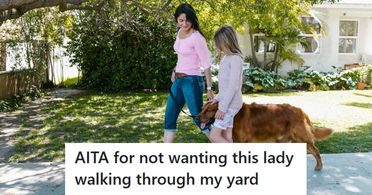 Woman walking with her daughter and golden retriever down the sidewalk