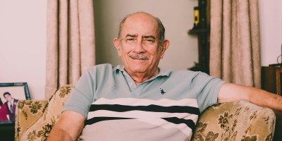 An old man on a couch