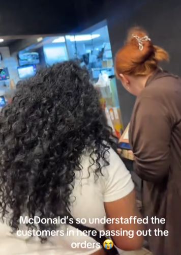 Woman taking charge at McDonalds