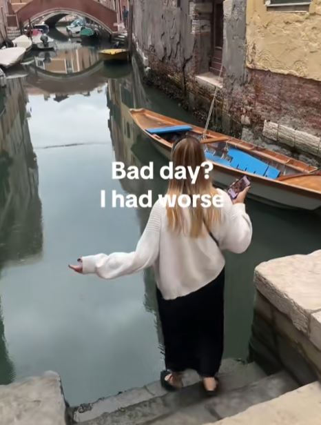 Woman walking down steps