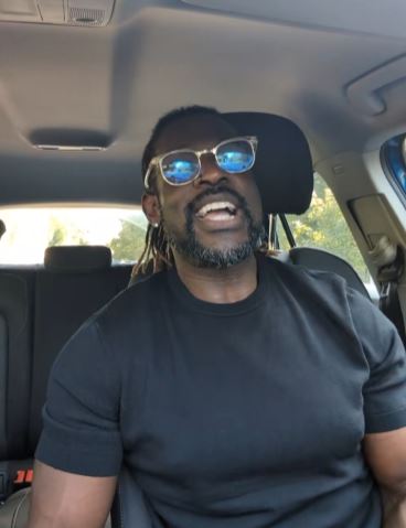 Black Scottish man talking