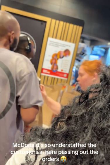 Woman taking charge at McDonalds