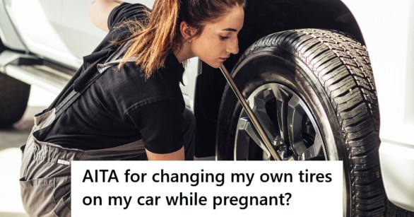 Woman changing car tire