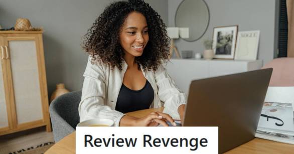 Young woman leaving a negative review for a restaurant online