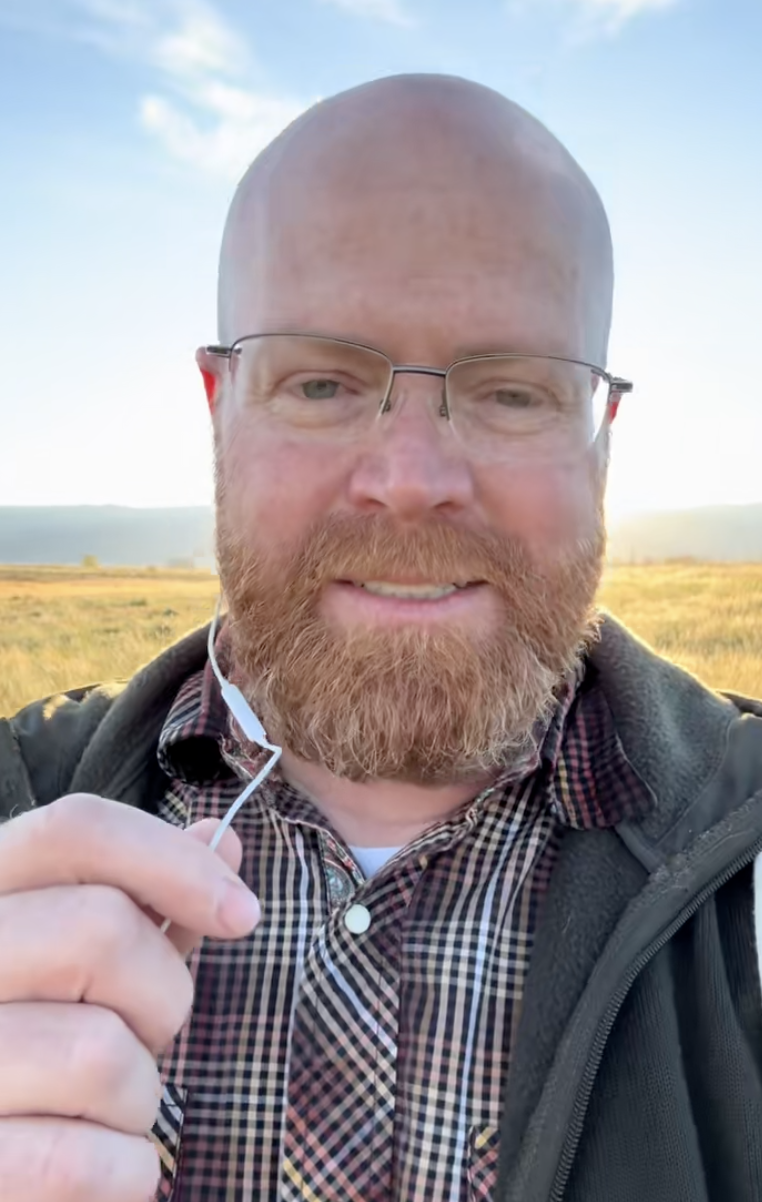 man talking to a camera