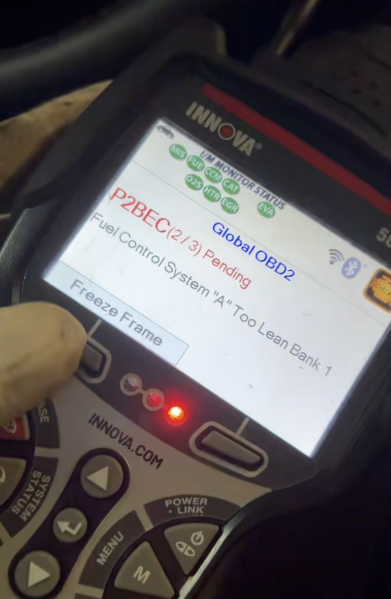 mechanic working on a car