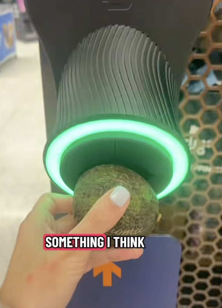 woman at an avocado reader