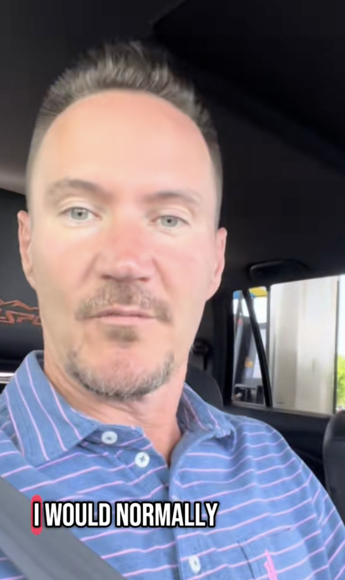 man sitting in a car