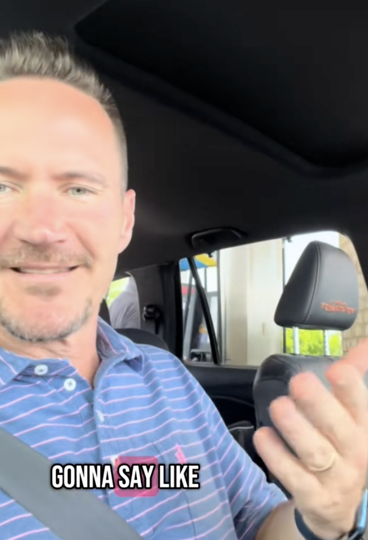 man sitting in a car